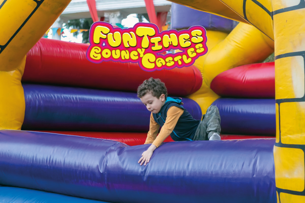 child playing bouncy castle party Pembrokeshire child playing bouncy castle party Pembrokeshire