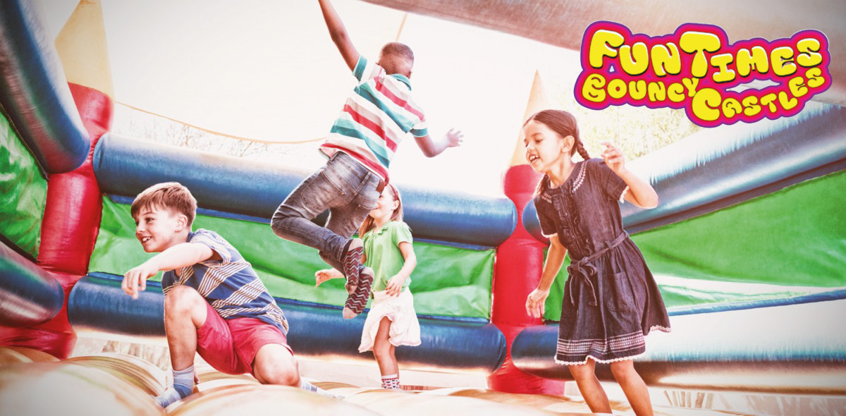 Child Safely Enjoying a Bouncy Castle with Safety Nets Child Safely Enjoying a Bouncy Castle with Safety Nets