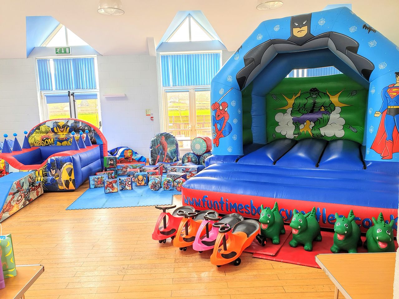 Fun Times Bouncy Castles at Llanarthne Village Hall - Camarthen Superhero Bouncy Castle, Superhero Soft Play Set with Air Juggler Ball Pool,