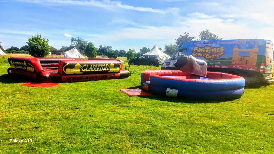 Rodeo Bull and Gladiator Duel inflatables at Llandysul, Ceredigion Inflatable Rodeo Bull and Gladiator Duel Llandysul
