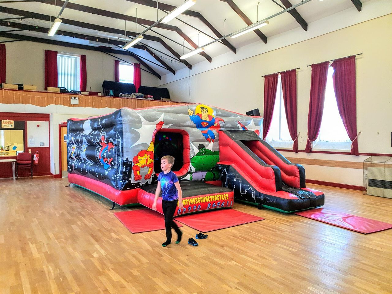 SUPER HERO 'DISCO' BOUNCY CASTLE/SLIDE COMBO